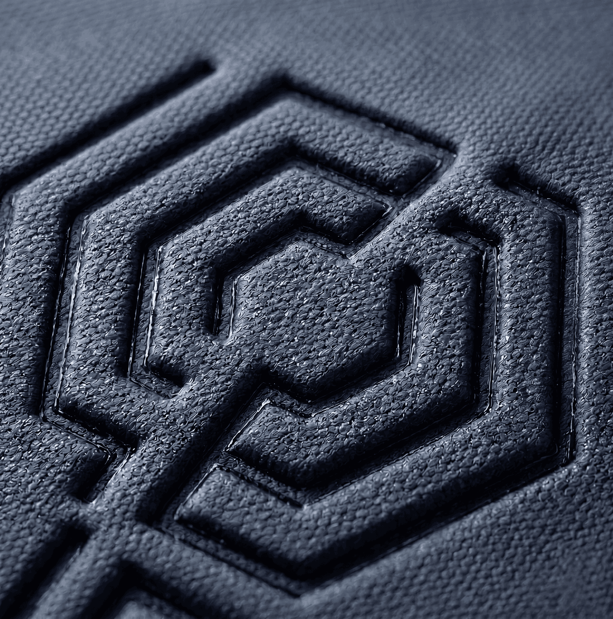 Ultrasonic embossing of geometric patterns